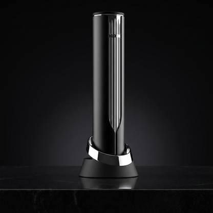 Column Electric Corkscrew in polished chrome on its charging base, studio shot on black