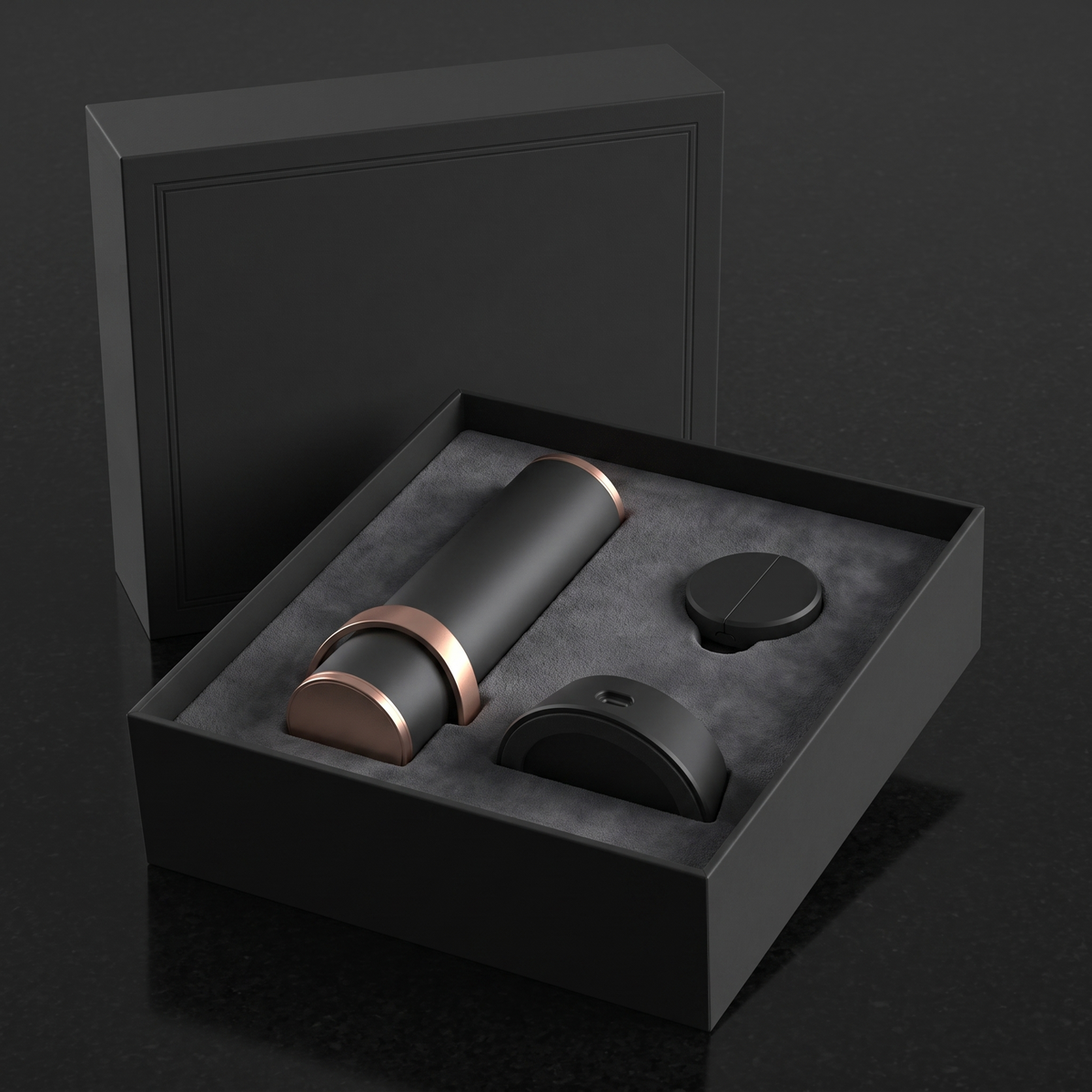 The Column in its suede-lined presentation box with the charging base and foil cutter