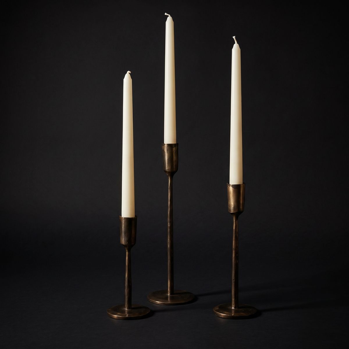 Forge Blackened Brass Candlesticks, set of three on black