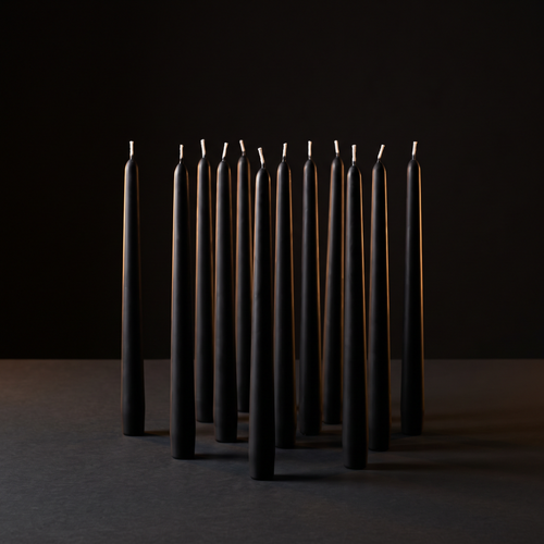 Twelve matte black tapers, unlit